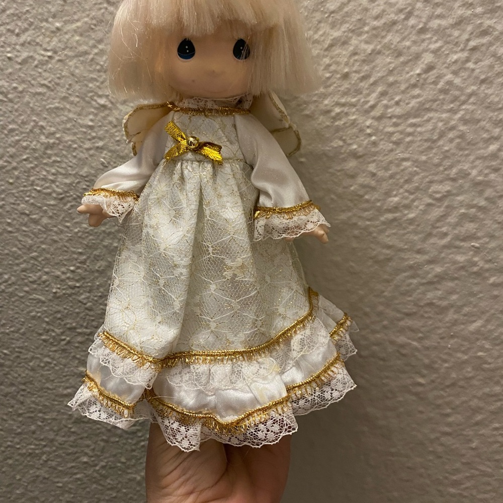 Elegant White and Gold Doll